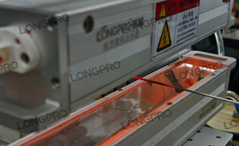 编织钢丝红外加热退火.jpg 编织钢丝红外加热退火.jpg